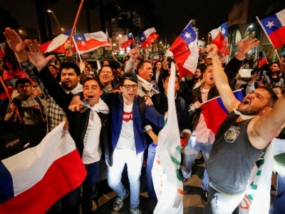 Chileans seek way forward after rejecting new constitution.